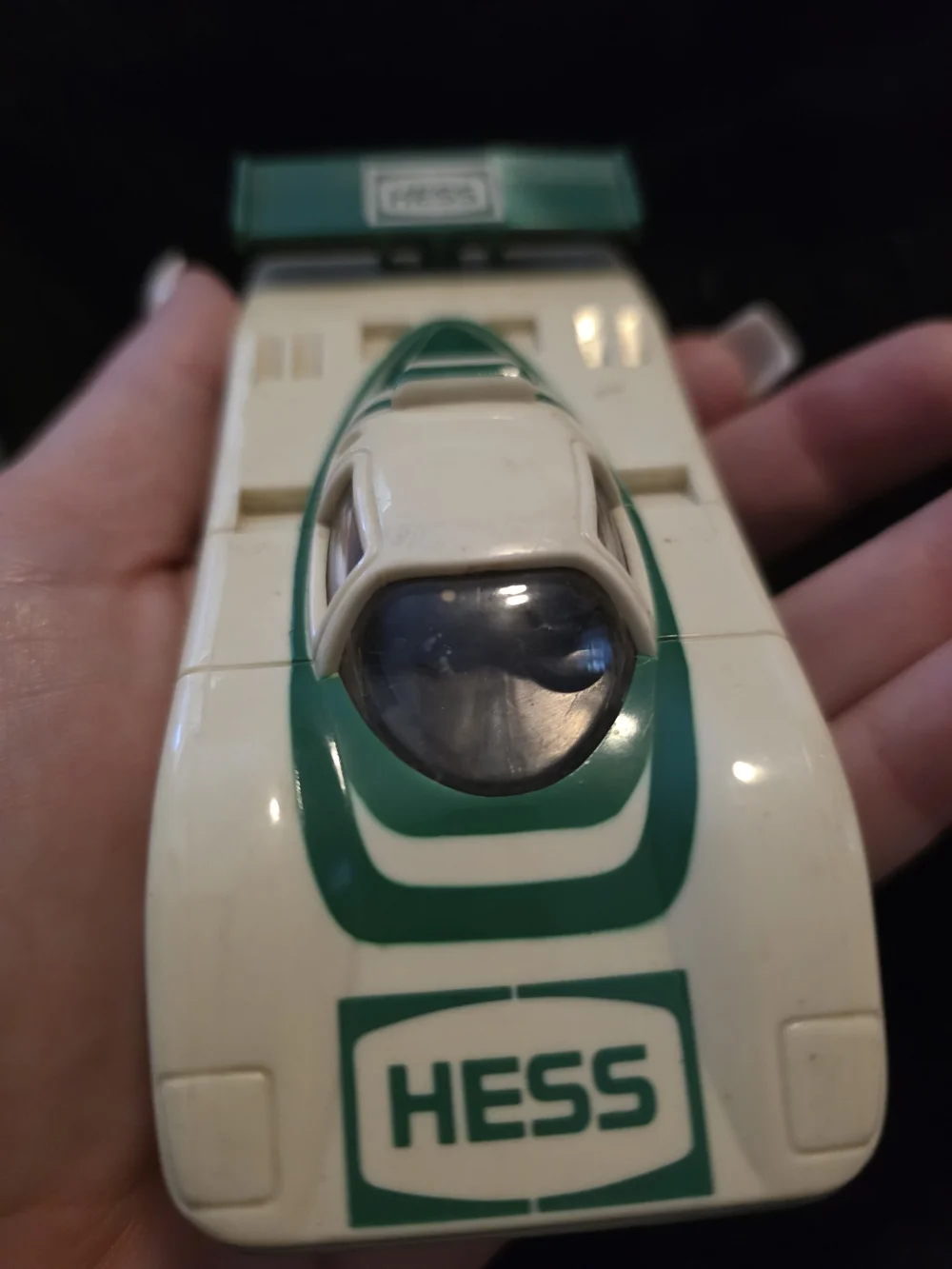 vintage 1988 Friction Activated Hess Race Car, a classic white and green plastic